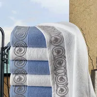 Asciugamani blu e bianchi con balza jacquard grigia a volute