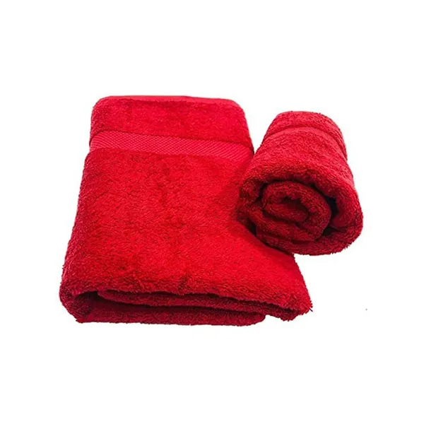 Gefaltetes rotes Velourshandtuch, daneben ein gerolltes Handtuch